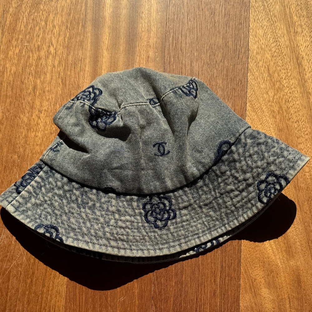 CHANEL Blue and Gray Denim Bucket Hat with Floral Design